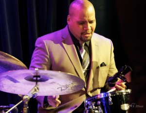 Sean Dobbins playing the drums. Image credit - A2 Jazz Fest.